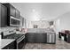 Modern kitchen with granite countertops and stainless steel appliances at 488 Vista Blvd, Brighton, CO 80603
