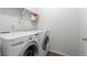 Laundry room with washer and dryer included at 488 Vista Blvd, Brighton, CO 80603