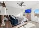 Main bedroom with ceiling fan and large windows offering natural light at 488 Vista Blvd, Brighton, CO 80603