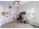 Home office with built-in shelving and large window at 488 Vista Blvd, Brighton, CO 80603
