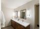 Bathroom with modern double vanity and updated lighting at 2512 Premier Pl, Boulder, CO 80304