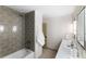 Clean bathroom with modern double vanity and tiled shower at 2512 Premier Pl, Boulder, CO 80304