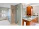 Elegant bathroom with glass shower, dual vanity, and marble at 2512 Premier Pl, Boulder, CO 80304