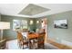 Formal dining room featuring a wood table and access to kitchen at 2512 Premier Pl, Boulder, CO 80304