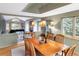 Bright dining room with hardwood floors and a view into the living area at 2512 Premier Pl, Boulder, CO 80304