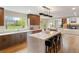 Spacious kitchen, island seating, and views of backyard at 2512 Premier Pl, Boulder, CO 80304