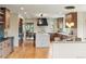 Modern kitchen with wood cabinets and large island at 2512 Premier Pl, Boulder, CO 80304