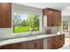 Kitchen sink with a view of the backyard at 2512 Premier Pl, Boulder, CO 80304