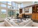 Living room boasts high ceilings, fireplace, and ample natural light at 2512 Premier Pl, Boulder, CO 80304