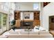 Spacious living room with fireplace and built-in shelves at 2512 Premier Pl, Boulder, CO 80304