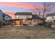 Spacious backyard featuring a patio with pergola, well-maintained lawn, and inviting atmosphere at 9407 Dolton Way, Highlands Ranch, CO 80126