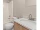 Updated bathroom with a vanity, toilet and shower/tub combo at 15907 E 13Th Ave, Aurora, CO 80011