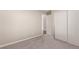 Bright bedroom with double door closet and carpet flooring at 15907 E 13Th Ave, Aurora, CO 80011