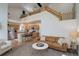 Open concept living space with kitchen, dining area and a great view of the second story loft at 16553 Gilpin St, Thornton, CO 80602