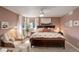 Charming main bedroom with large bed, neutral decor, and natural light at 16553 Gilpin St, Thornton, CO 80602