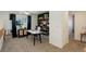 Inviting home office with shelving and ample space for productivity at 16553 Gilpin St, Thornton, CO 80602