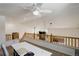 Open loft-style office with desk and natural light at 16553 Gilpin St, Thornton, CO 80602