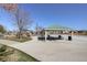 Community park featuring a covered picnic area, a playground, and plenty of green space at 16553 Gilpin St, Thornton, CO 80602