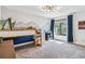 room featuring a bunk bed, mural artwork, and natural light from the window at 7388 S Ireland Cir, Centennial, CO 80016