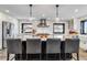 Stylish kitchen boasts a large marble island, stainless steel appliances, and modern finishes at 7388 S Ireland Cir, Centennial, CO 80016