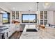 Kitchen with a large island, stainless steel appliances, and a view to the outside at 7388 S Ireland Cir, Centennial, CO 80016