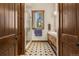 Modern bathroom showcasing stylish tile flooring, wood cabinets, and a spacious shower at 209 American Way, Breckenridge, CO 80424