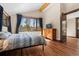 Comfortable bedroom featuring an open window showcasing the beautiful outdoors at 209 American Way, Breckenridge, CO 80424