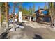Stunning home with modern design elements, wood accents, and lush trees at 209 American Way, Breckenridge, CO 80424