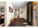 Inviting foyer with dark tile floor, wood accents and artwork at 209 American Way, Breckenridge, CO 80424