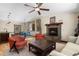 Open-concept living area with stone fireplace, seamlessly connects dining area at 209 American Way, Breckenridge, CO 80424