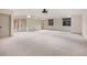 This basement features carpet flooring, ample space, and modern recessed lighting at 424 Grape St, Denver, CO 80220
