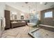 A luxurious bathroom features a soaking tub, walk-in shower, double vanity, and modern fixtures at 424 Grape St, Denver, CO 80220