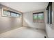 Neutral bedroom featuring natural light and plush carpeting at 424 Grape St, Denver, CO 80220