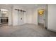 Large bedroom with sliding barn door and ensuite bathroom at 424 Grape St, Denver, CO 80220