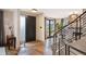 Welcoming foyer featuring a staircase and front door at 424 Grape St, Denver, CO 80220
