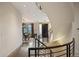 Elegant foyer with a spiral staircase, hardwood floors, and dining room at 424 Grape St, Denver, CO 80220