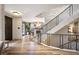 Well lit entry foyer with stairs and hardwood floors at 424 Grape St, Denver, CO 80220