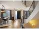 Elegant foyer with a spiral staircase and a dining room at 424 Grape St, Denver, CO 80220