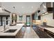 Modern kitchen with a large island, high-end appliances, and open design at 424 Grape St, Denver, CO 80220