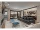 Spacious living room with a modern fireplace, and an open-concept design, perfect for entertaining and relaxation at 424 Grape St, Denver, CO 80220