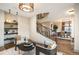Open concept living space with stairs leading up at 424 Grape St, Denver, CO 80220