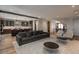 Open-concept living area with a modern kitchen, staircase, and dining area, creating a spacious and connected home at 424 Grape St, Denver, CO 80220