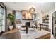 Bright living room with a fireplace, large windows, and modern furnishings at 424 Grape St, Denver, CO 80220