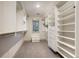 This large walk-in closet features ample shelving, drawers, and storage for an organized wardrobe at 424 Grape St, Denver, CO 80220