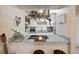 Updated kitchen features white cabinetry, granite countertops, and modern appliances at 12354 W Nevada Pl # 102, Lakewood, CO 80228