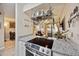 Updated kitchen with modern appliances, granite counters, and open floor plan at 12354 W Nevada Pl # 102, Lakewood, CO 80228