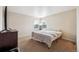 Cozy bedroom with carpet, natural light, and a comfortable bed at 9316 Harrison St, Thornton, CO 80229