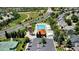 Aerial view of community pool, club house, tennis courts, and green space at 18647 E Berry Dr, Aurora, CO 80015