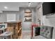 A finished basement with a custom bar and beverage cooler, perfect for entertaining guests at 18647 E Berry Dr, Aurora, CO 80015