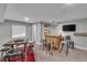 Finished basement area with a full wet bar and seating at 18647 E Berry Dr, Aurora, CO 80015